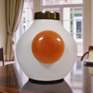 Elegant White Vase with Orange Gem Accent