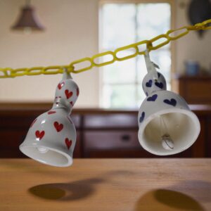Hand-Painted Heart Hanging Bells – Ceramic Artisan Decor (Set of 2)